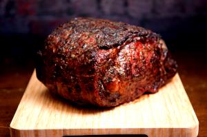 100 G Beef Chuck (Blade Roast, Lean Only, Trimmed to 1/2" Fat, Prime Grade, Cooked, Braised)