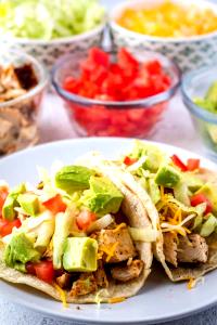 100 G Taco or Tostada with Chicken, Cheese, Lettuce, Tomato and Salsa