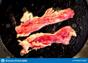 2 pan fried slices Bacon