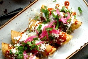 4 each Chicken Flautas with Chile con Queso
