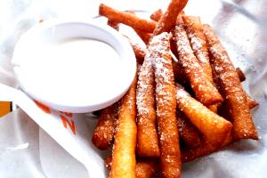 9 sticks with 2 tsp powdered sugar (59 g) Funnel Cake Sticks