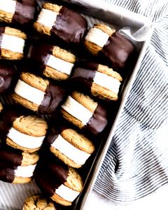 one sandwich (142 g) Double Chocolate Cookie with Peanut Butter Ice Cream