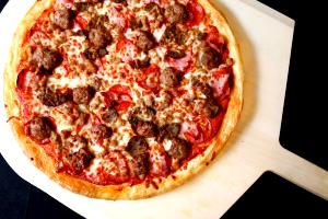 1 Pizza (9 Dia) Thick Crust Pizza with Meat and Vegetables