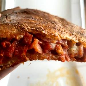 1 slice (143 g) 13 Bronx Bomber Pizza
